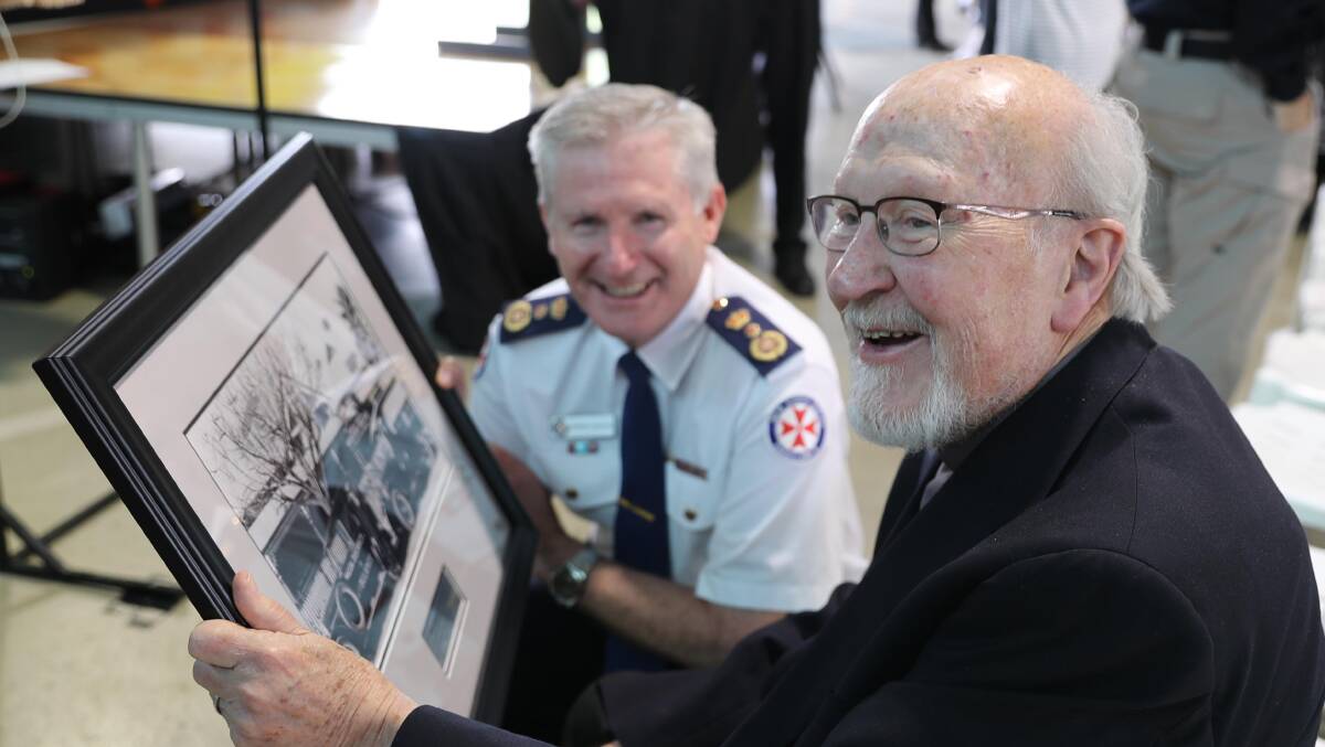 Step in time: Father Tony Loth shared the memories of Wagga's very first ambulance station - originally built and operated by his father - with Ambulance commissioner Dominic Morgan. Picture: Les Smith 