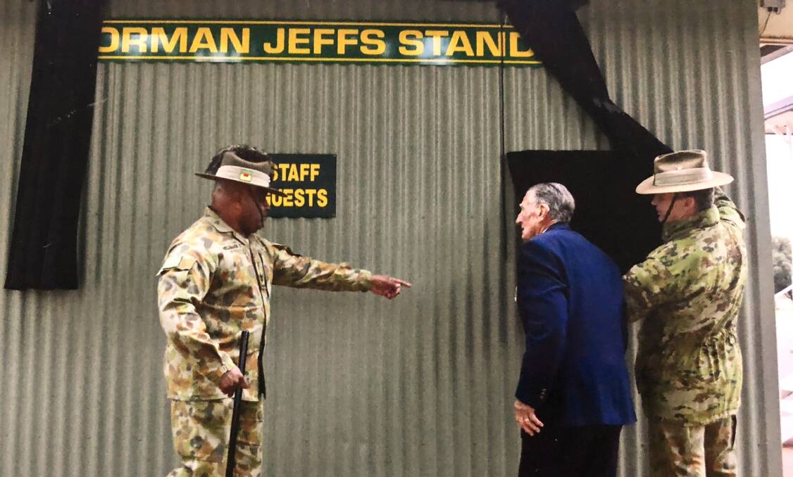 Emblazoned legacy: When Kapooka Commandant Colonel Mick Garraway (R) unveiled Norm Jeffs’ name on the side of a parade-ground grandstand, the WWII veteran said: 'You could have knocked me over'. 