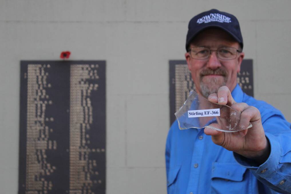 Piece of the past: Stuart Meiklejohn - the nephew of Wagga's WWII bomber pilot Robert Bruce Meiklejohn - with a piece of the Sterling ED-366 that became his uncle's coffin. Picture: Steff Wills 
