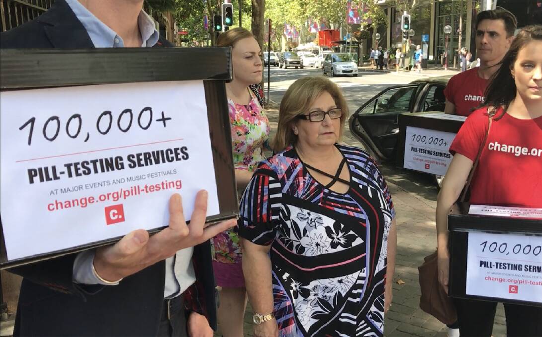 MOTHER'S PLEA: Adriana Buccianti, whose son Daniel died of a drug overdose at a music festival in 2012, delivers a petition calling on pill-testing services at music festivals to the NSW Parliament on January 25. More than 100,000 people had signed the petition online before it was presented to NSW Opposition Leader Michael Daley. 