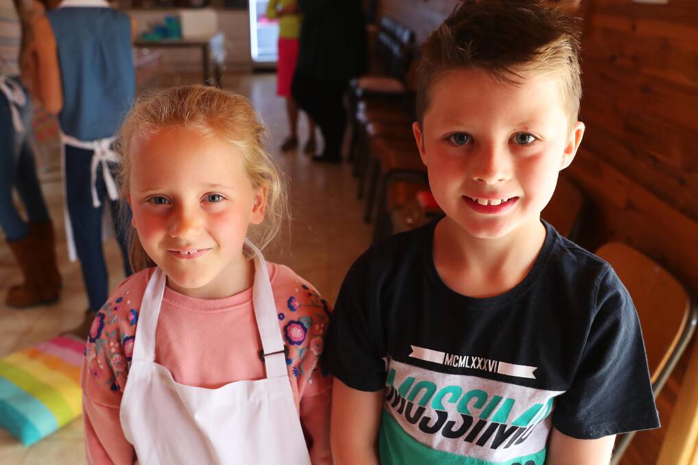 HOLIDAY FUN: Phillipa Lashbrook, 7, and Harrison Lange, also 7, enjoy the school holidays at Cackleberries by Lashbrook Farm. Picture: Emma Hillier