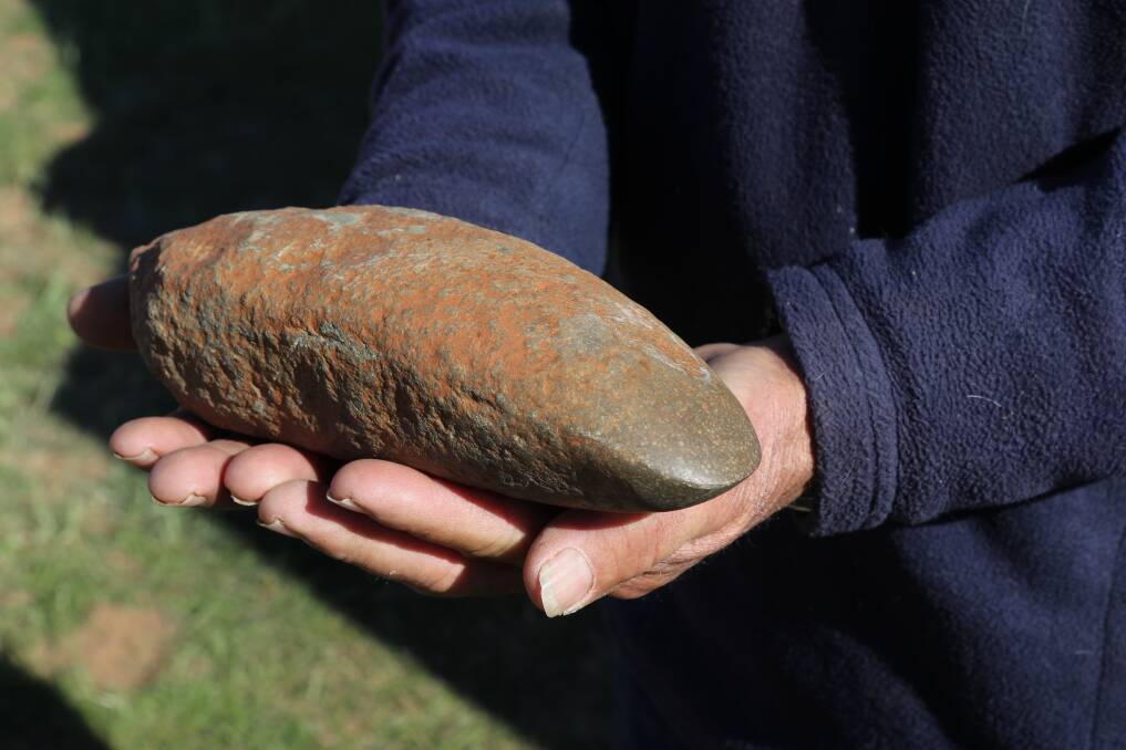 ANCIENT FIND:  A stone axe found on a Riverina farm. Picture: Contributed