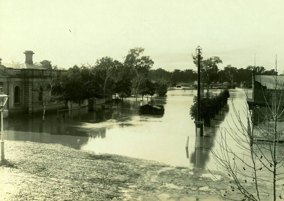 WET TIMES: Morrow Street during the flood of 1891. On the left is the Council Chambers building which was completed in 1888. Picture: Gormly Collection CSURA RW98.25
