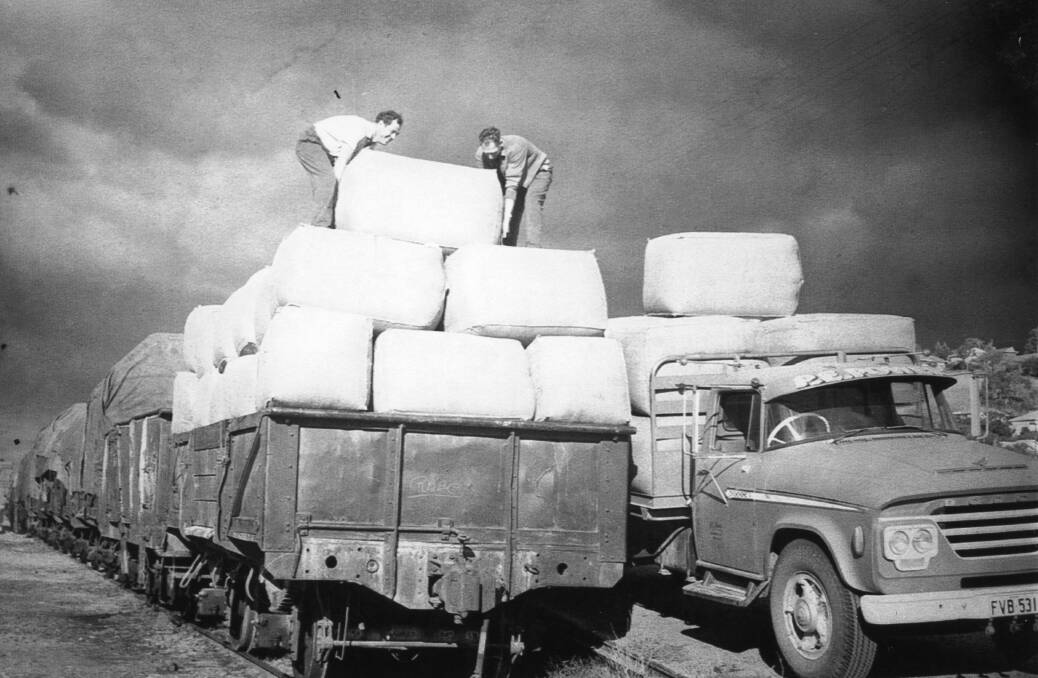 P E Power carriers loading wool bales onto rail cars. Contact Wagga Wagga and District Historical Society at www.wwdhs.org.au  or on Facebook at wagga.history. Picture: CSURA Lennon Collection