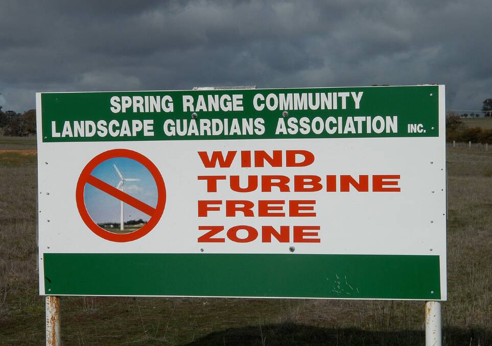 DIVIDE: Not everyone wants the landscape to be covered with turbines. This sign was near Canberra.