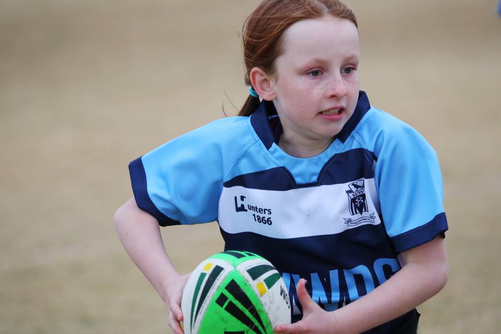 FOCUS: Holly Bennett looks to pass during last week's Mortimer Shield Gala Day in Wagga. Picture: Emma Hillier 