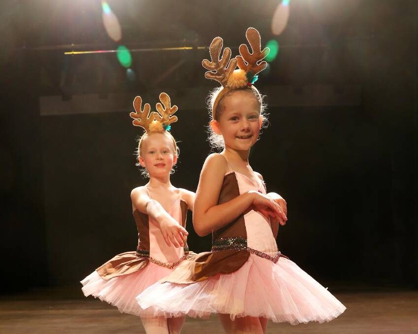 CENTRE STAGE: Remy Pigran, 7, and Eloise Angel, 8, prepare for the Wagga Academy of Ballet end of year performance. Picture: Emma Hillier