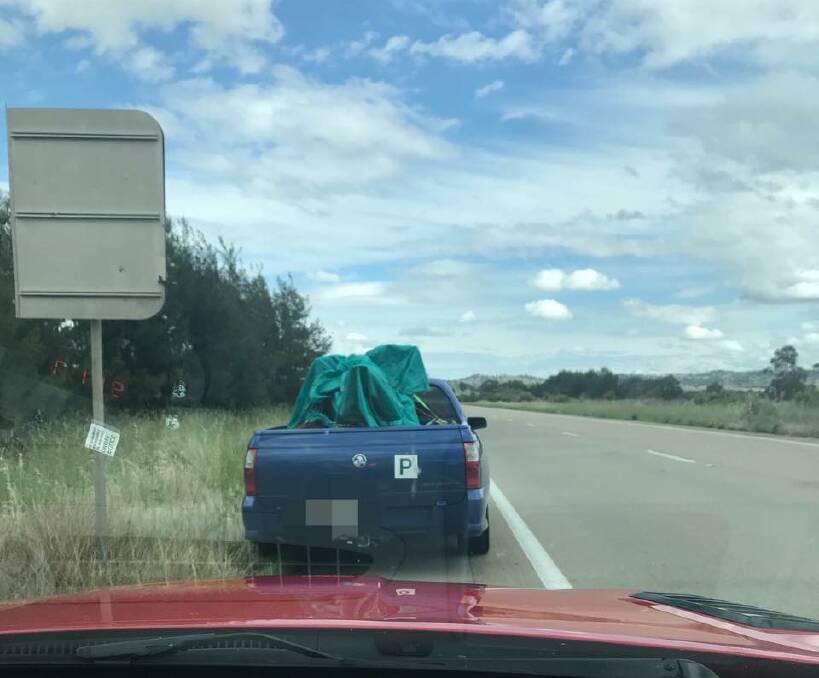 BANNED: A 17-year-old Learner driver was banned from NSW roads after being caught in this ute driving in the right-hand lane with an unsecured load and not property supervised near Gundagai on Tuesday morning.