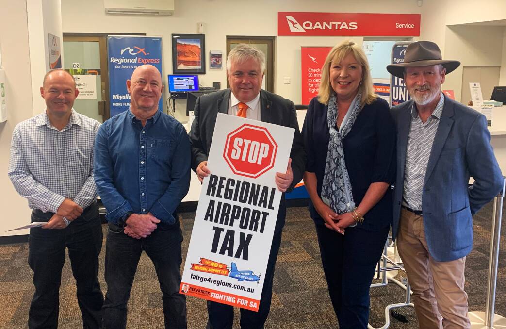 MEETING: The group came into contact with Senator Rex Patrick, centre, at the Whyalla Airport on Saturday, March 14.