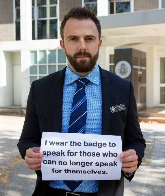 Speaking: Federal police detective Jarryd Dunbar shows what motivates his commitment to upholding laws and finding wrong-doers. Picture: TWITTER