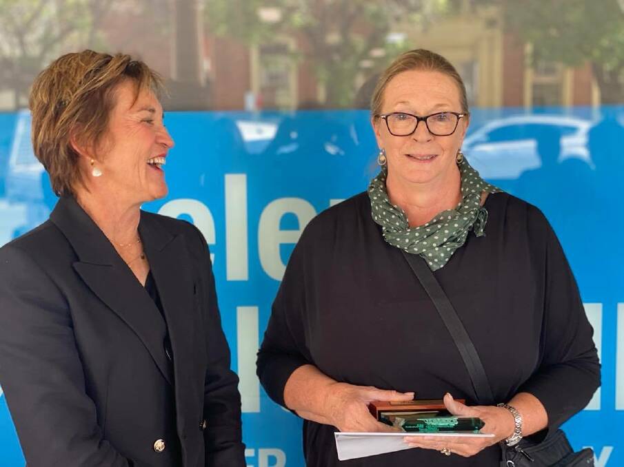Not happy: Shirlee Burge looks at the camera while with member for Murray Helen Dalton earlier this year when she received a community service award. Picture: FACEBOOK