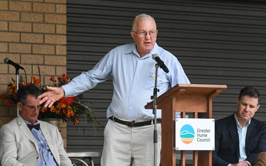 Greater Hume mayor Tony Quinn addresses those gathered for the shire's Australia Day presentation at Wymah within sight of Lake Hume. Picture by Mark Jesser