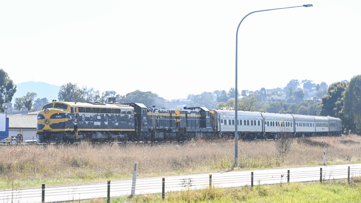 Southbound: The Southern Aurora heads towards Wodonga after leaving Albury station on Sunday morning.