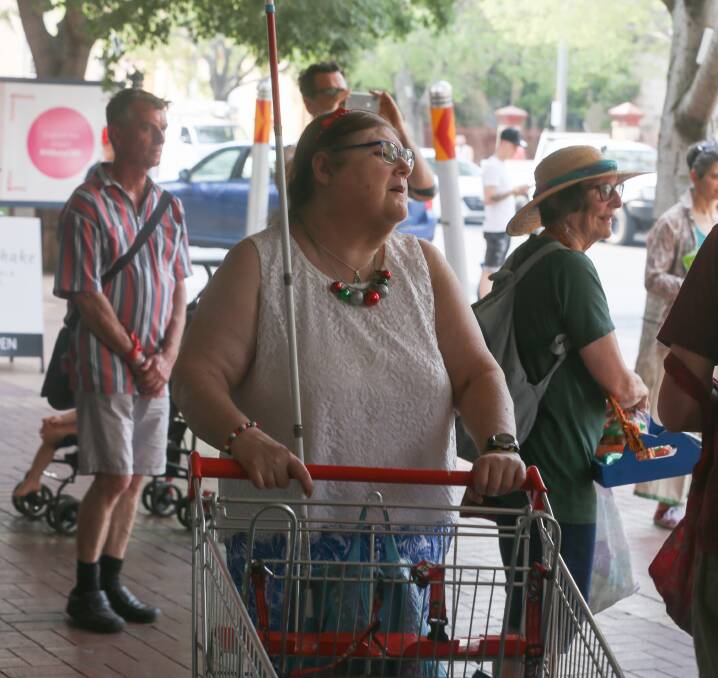 Not expected: Thurgoona shopper Mary Esler watched on with intrigue as she wheeled her trolley along Dean Street. Picture: TARA TREWHELLA