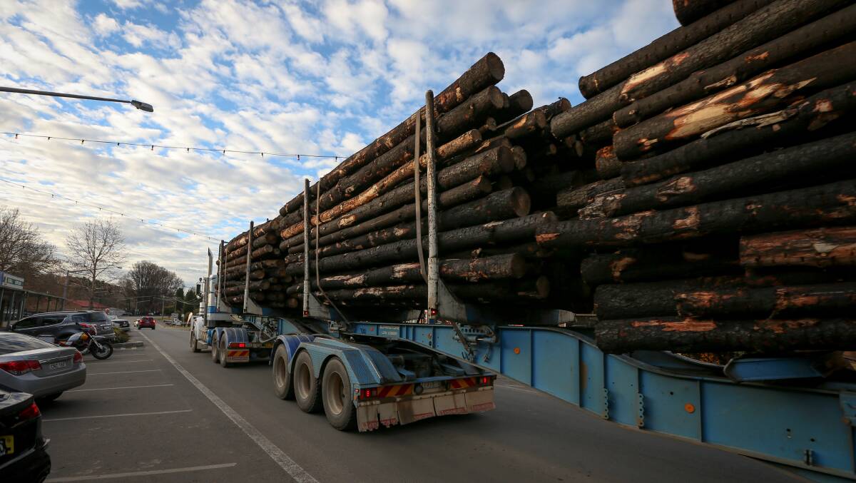 More uses: A fully laden semi-trailer moves through the main street of Tumbarumba to the town's timber mill which is now going to be able to better utilise logs thanks to a $2.99 million funding boost from the NSW government. Picture: JAMES WILTSHIRE