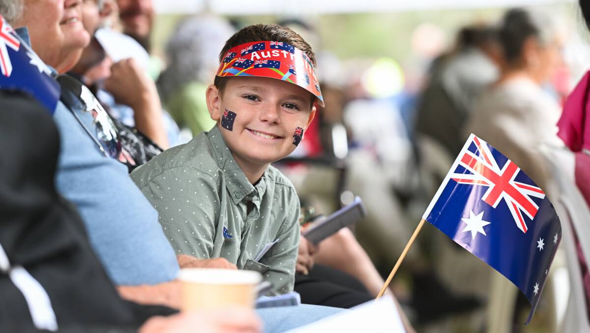 Ivan Willis, 10, of Henty, was among the hundreds who watched on as speeches were delivered and awards presented at Wymah. Picture by Mark Jesser