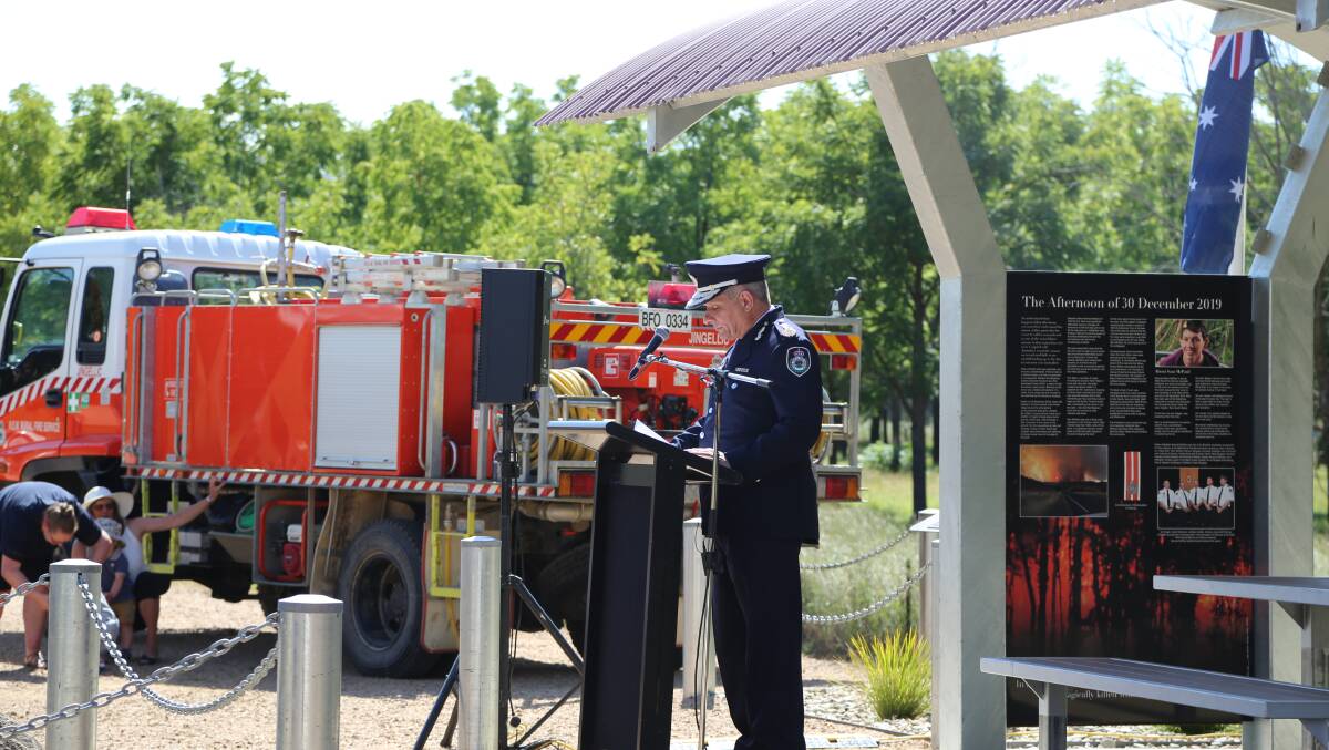 Solemn speech: NSW Rural Fire Service commissioner Rob Rogers addresses those gathered at the launch of the tribute to Samuel McPaul west of Jingellic on Saturday.