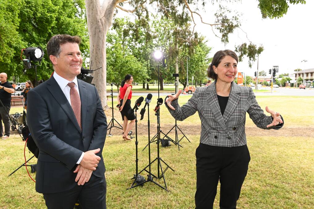 Justin Clancy with Gladys Berejiklian in Albury in November 2020 when the NSW border closure for COVID was ending. Picture by Mark Jesser