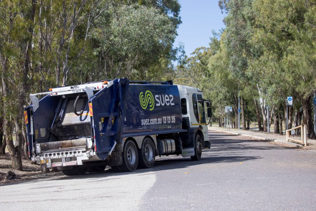 Canberra's garbage trucks will carry cameras to screen the roads and identify all the worst holes. Picture: Sitthixay Ditthavong