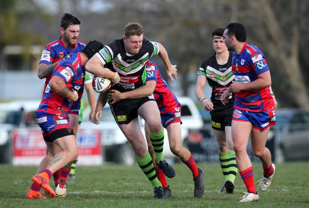 HILL TO CLIMB: Thunder prop Brad Hill rumbles forward in the 34-point win over Roos. Hill always carries the ball with great purpose.