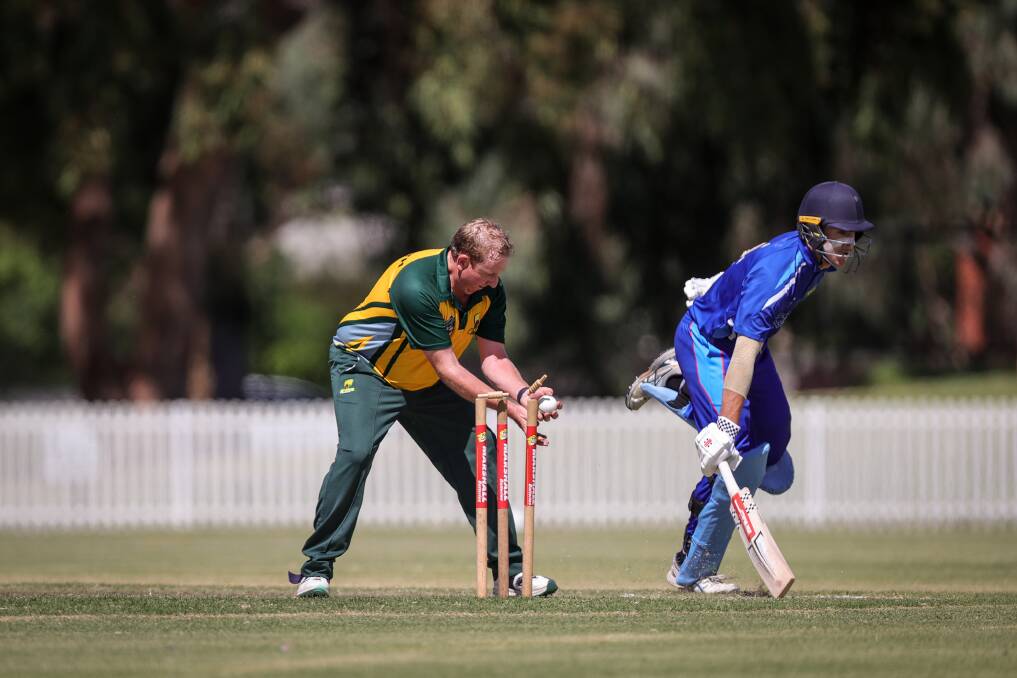 Cricket Albury-Wodonga's Oscar Lyons survives a close call as Griffith's Josh Carn attempts a run out as the O'Farrell Cup made its return. Picture by James Wiltshire