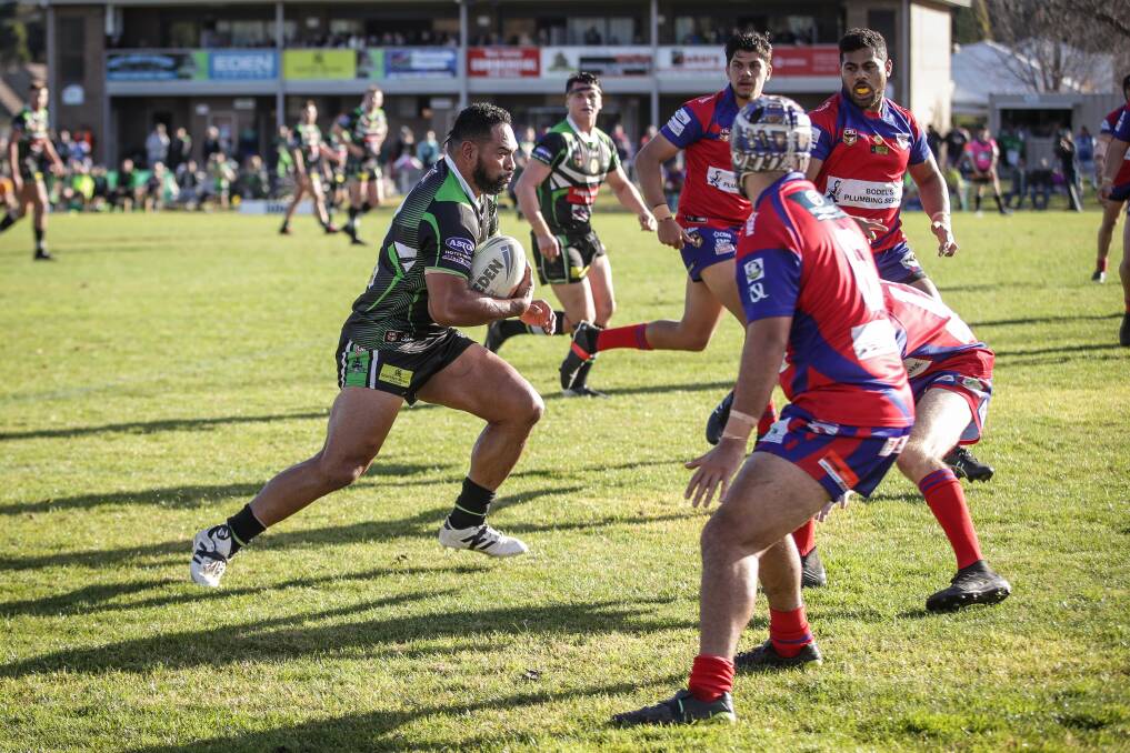 ON THE CHARGE: Thunder centre Etu Uaisele looks to crash through the 'Roos' defence in the first half. The former NRL player scored a try in the win.