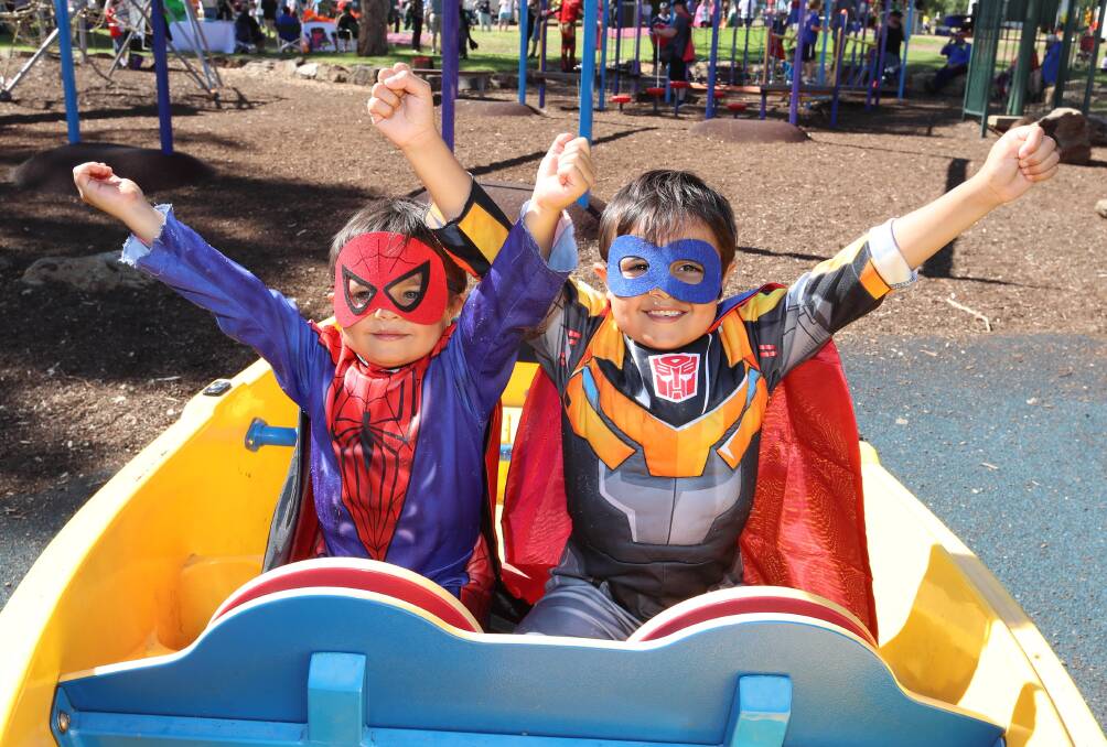 SUPERHEROES UNITE: Raulee Smith, 4, and his brother Rhylan Smith, 7, dressed as their favourite characters for the Superhero Autism Walk. 