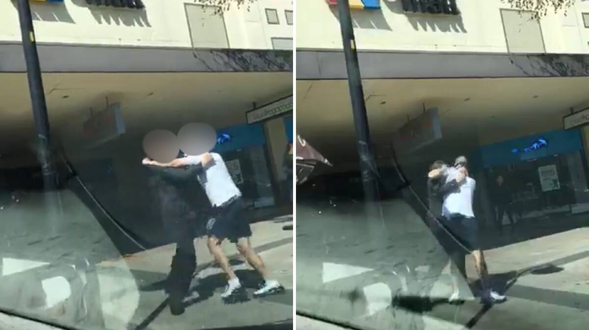 Men brawl outside a Wagga shopping centre. Picture: Screengrab Scudd Dunks/Facebook