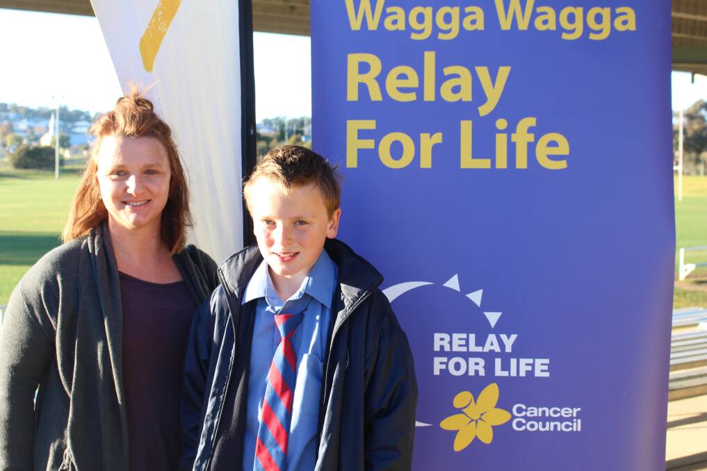 COUNTDOWN BREAKFAST: Lachlan and Mel Bruce popped by to learn more about the Relay for Life and said it was a good cause because everyone has been touched by cancer. Picture: Annie Lewis