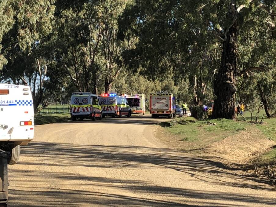 Ambulance, police, the Rural Fire Service and the Wagga Rescue Squad attended the scene at River Road. Picture: Annie Lewis 