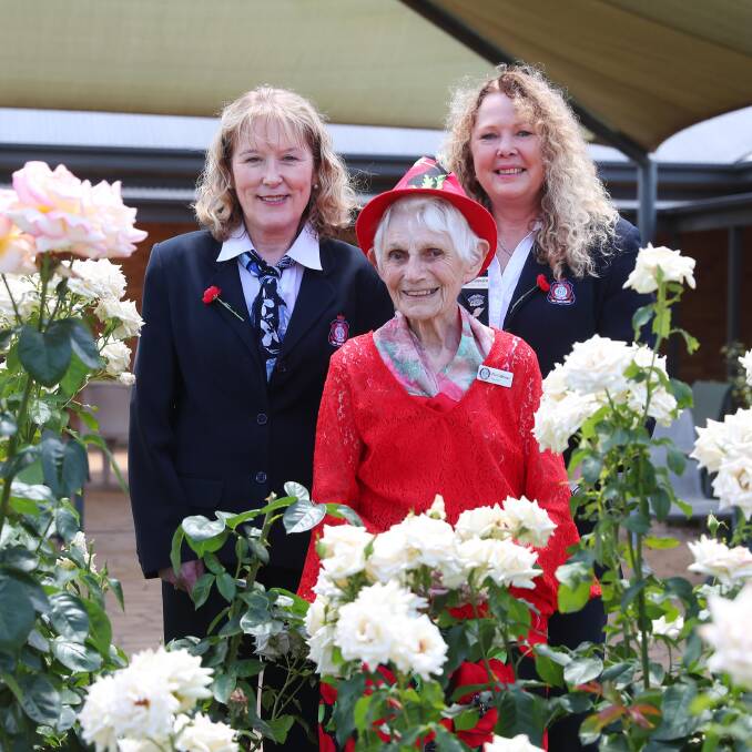IN THE GARDEN: Ros Brown and Jen Snowden enjoy working with Flo Gibbons and jokingly call her 'Flossy' instead of 'Bossy'. Picture: Emma Hillier 