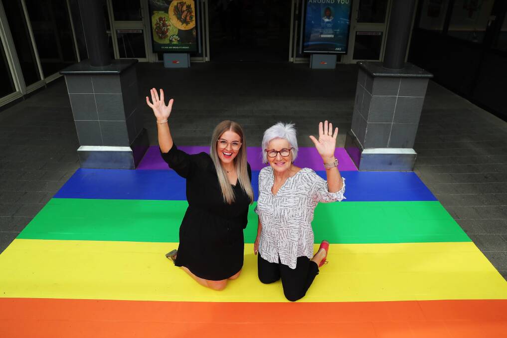 SHOWING SUPPORT: Caitlin Howell and Lynda Walsh show off the new rainbow entrance. Picture: Emma Hillier 