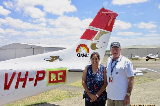 TAKE TO THE SKIES: Dianne Butler with one of the Angel Flight pilots as they prepare to set off from Hay. Picture: Supplied 