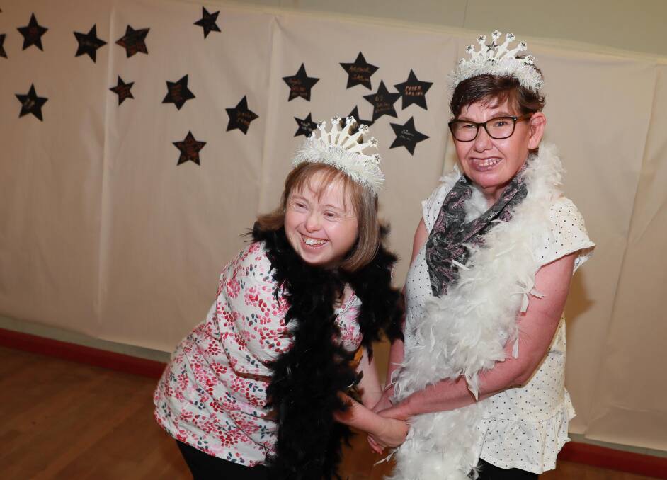 TIME TO DANCE: Louise Geaghan and Helen Makeham looking glamorous with their princess crowns. Picture: Les Smith 