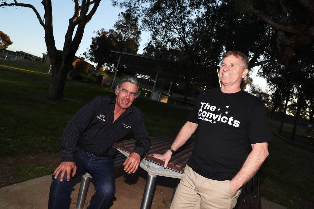 CELEBRATING LOCAL: Michael Henderson and Daryl Day encourage residents and visitors to come down and support local talents and the Wagga Boat Club. Picture: Emma Hillier 