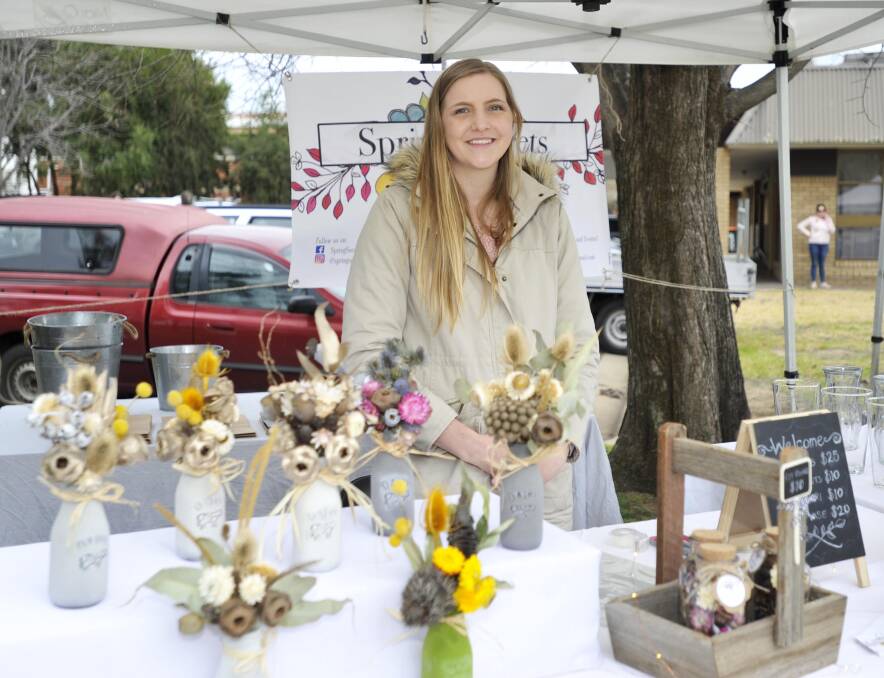 Haley Toms with her stall Spring Secrets at the Wollundry Markets. 
