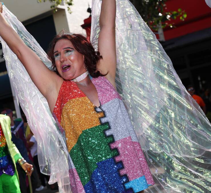 ALL SMILES: Holly Conroy couldn't stop grinning as she parades down Baylis Street to the claps and cheers of thousands at Mardi Gras. Picture: Emma Hillier
