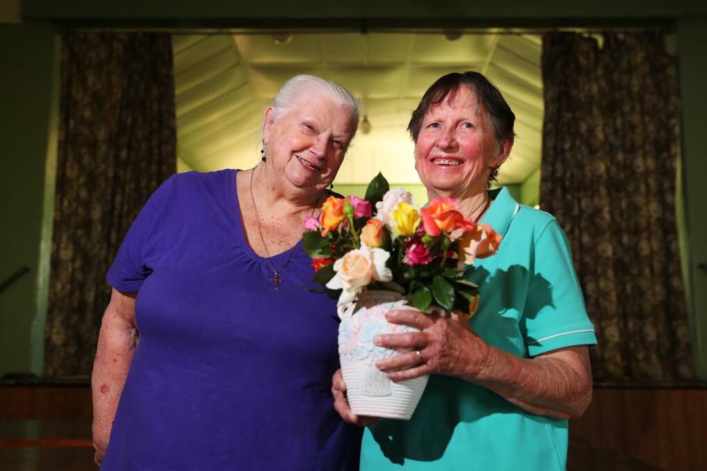 PICK A ROSE: Joy Hogno and Ann Wakem encourage Riverina residents to take a drive and visit Ladysmith this weekend. Picture: Emma Hillier 
