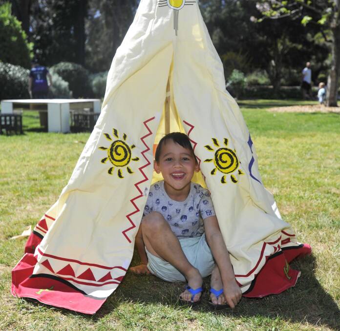 FUN FOR EVERYONE: Hudson Fuimaono, 6, jumped at the opportunity to play in one of the teepees. The teepees were one of many fun zones for children to enjoy. Picture: Chelsea Sutton