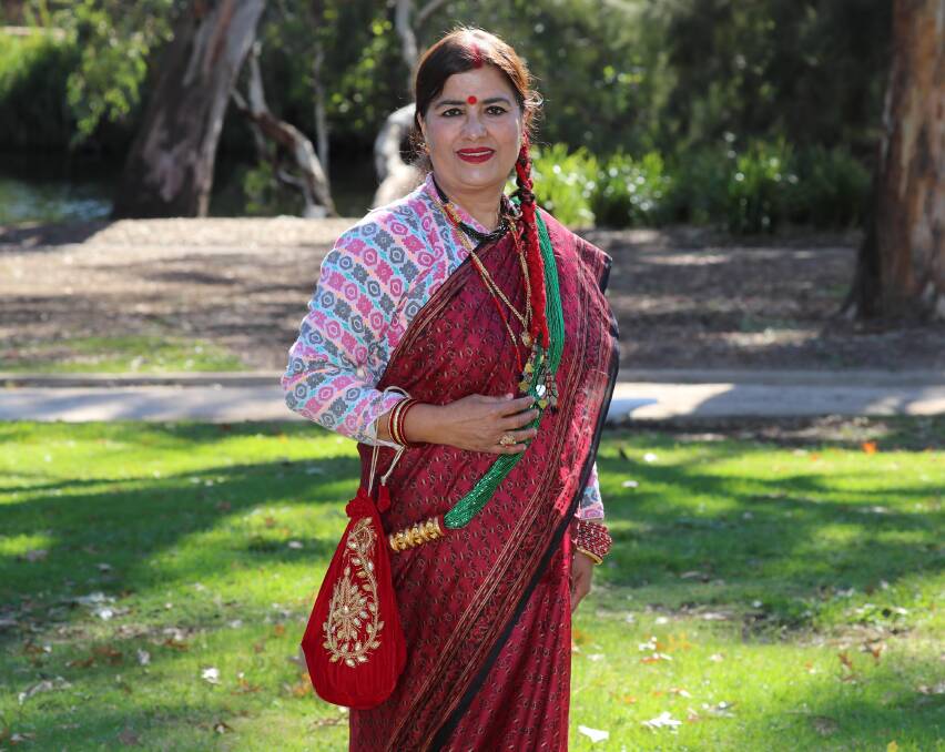 REPRESENTING NEPAL: Geeta Parajuli says she is proud of her heritage and the traditional dress that reminds her of Nepal's rich history. Picture: Les Smith 