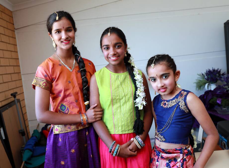 CULTURE, RHYTHM, REJOICE: Jhaanavi Karunapalan, 14, Thiyasha Jayasuriya, 10, and Sanuli Jayawardana, 8. Picture: Les Smith 