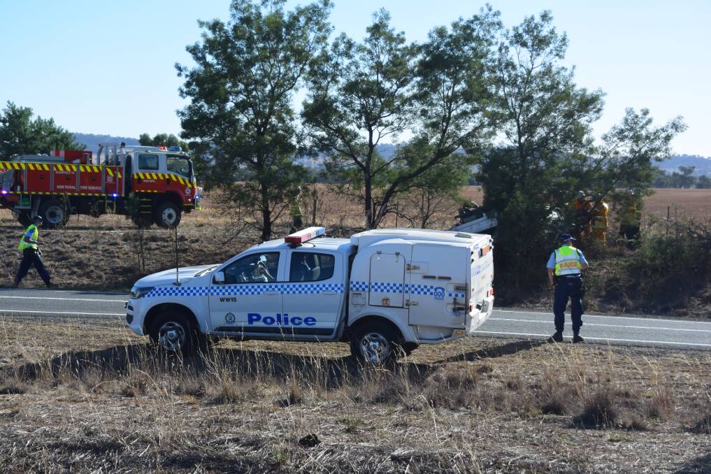 RESPONSE: Police and the RFS respond to a two-vehicle collision on Coolamon Road north of Wagga. 