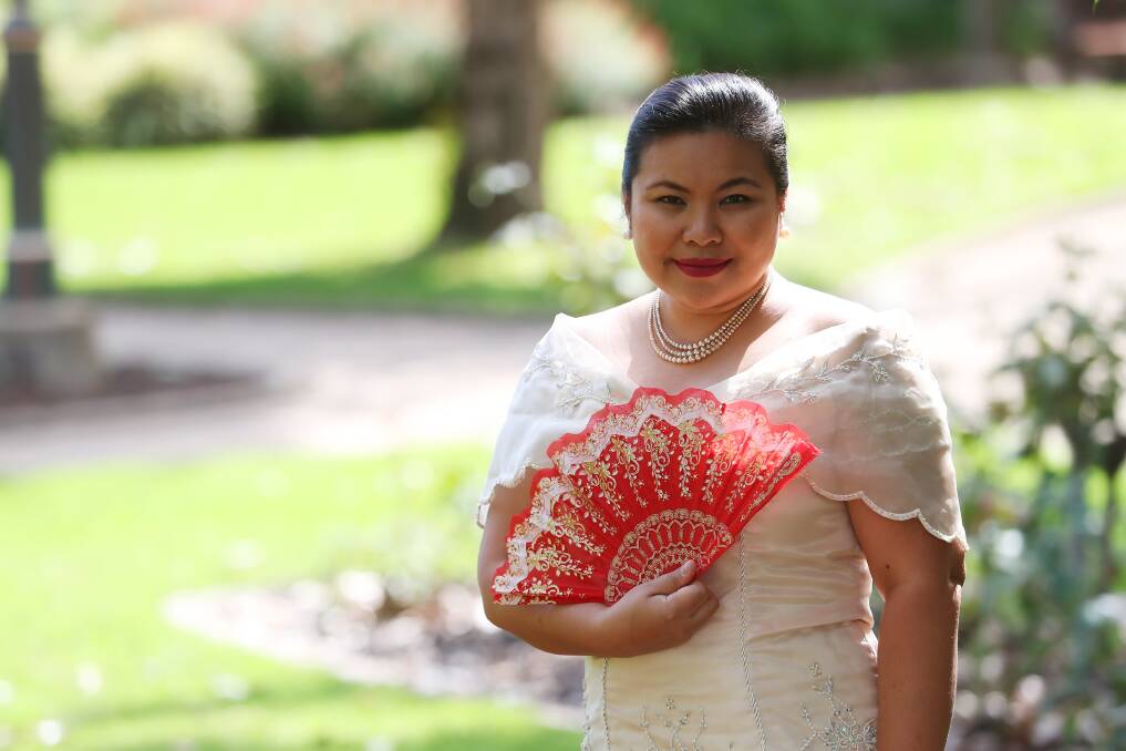 PROUD OF HER HERITAGE:  Annabelle Borja wears the national dress that is inspired by Maria Clara, who is a Filipino female heroine. Picture: Emma Hillier 
