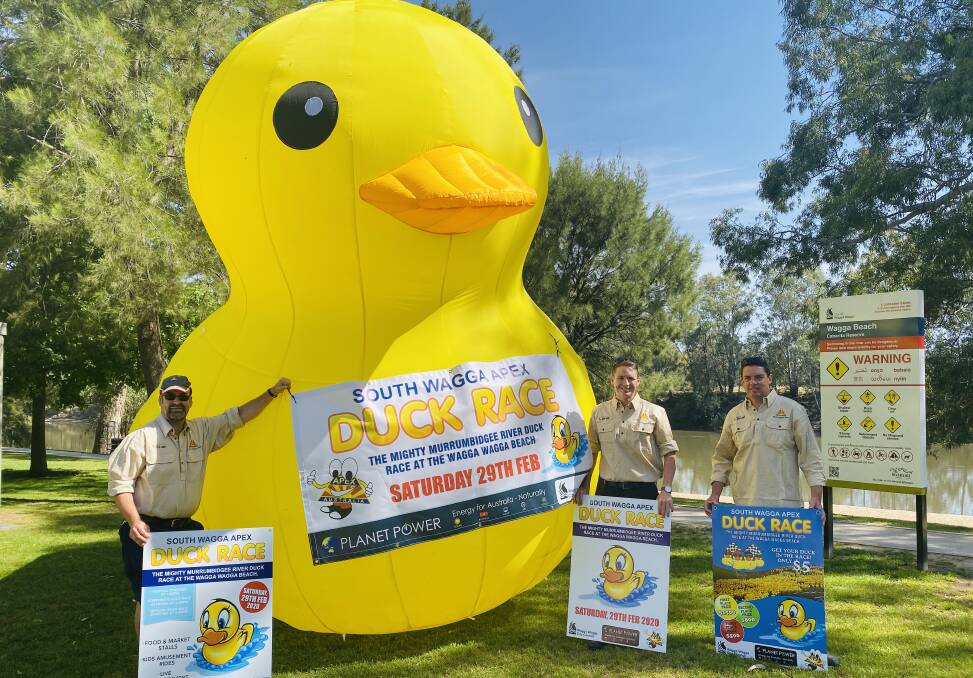 MIGHTY DUCK RACE: Scott Bredin, Joshua Paul and Tim Sheather with the mascot for the 2020 event. 