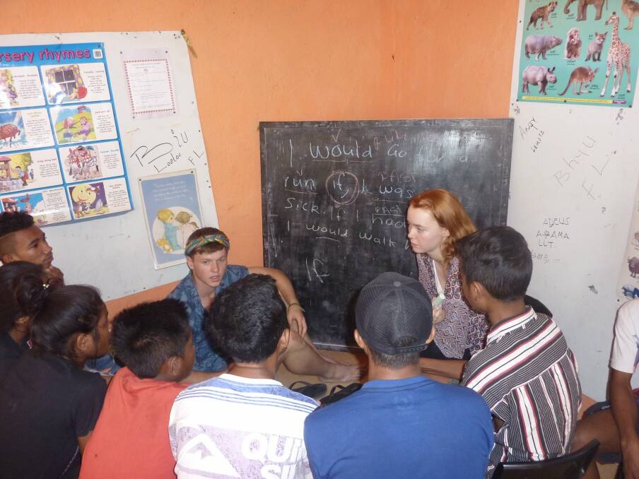 CLASSES: Isaac Erbacher enjoyed teaching English to some of the locals he met in East Timor. Picture: Supplied 