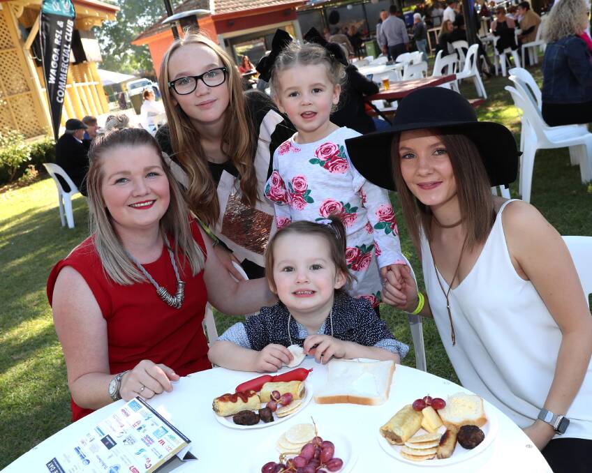FUN WITH FRIENDS: Rosie Hudson, 2, with (from left) Lani Hudson, Rhiannon Moore, 2, Frankie Coates and Jess Dixon at the 2018 race day. 