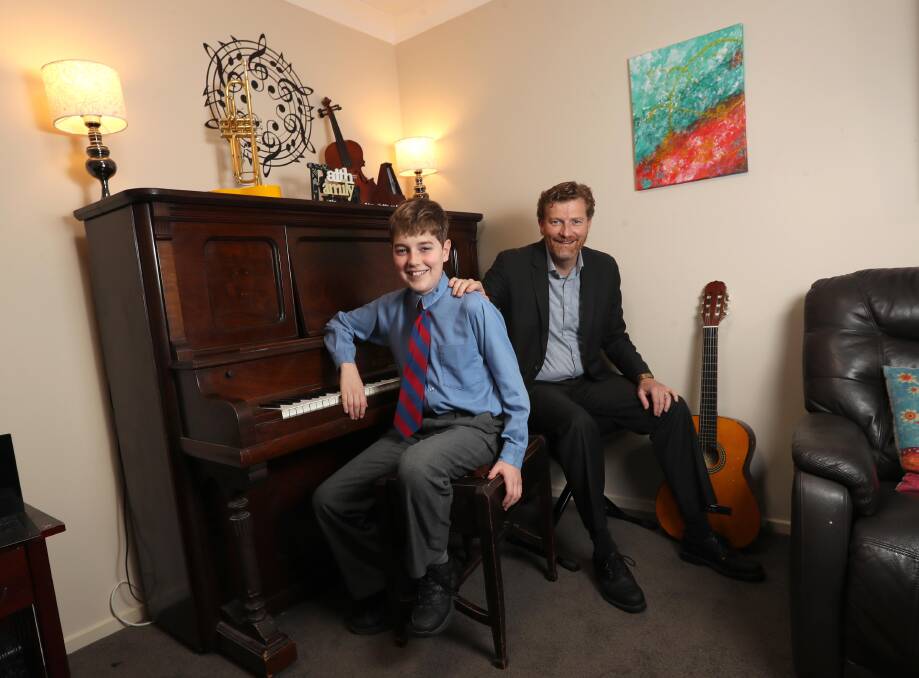 PROUD FATHER: Joshua and Dominic Byrne, who admires the way his son handles what life throws at him. Picture: Les Smith 