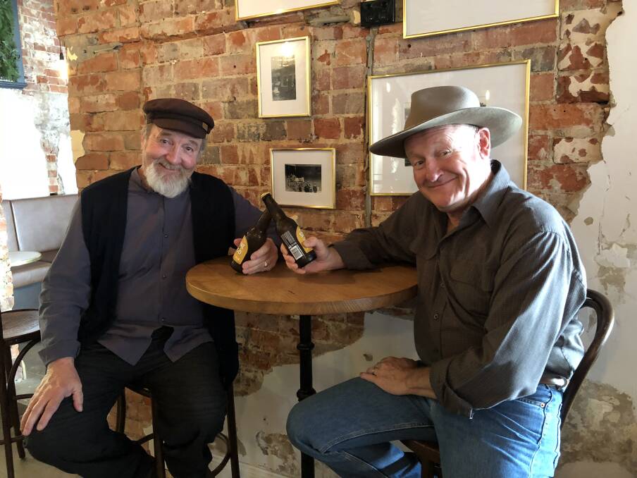 A CHEEKY BEER: Peter Cox and Stephen Holt will take tour groups around telling the stories of pubs past and present. Picture: Annie Lewis 