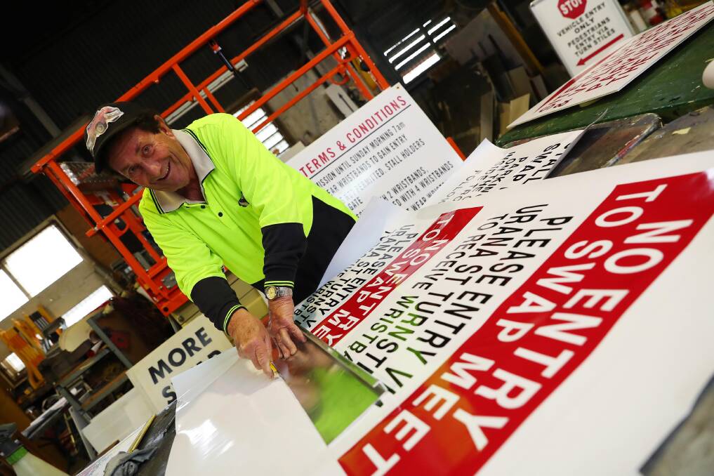 VOLUNTEER: Des Gibbs provides all the necessary signage for the event and is in the midst of making them all. Picture: Emma Hillier 
