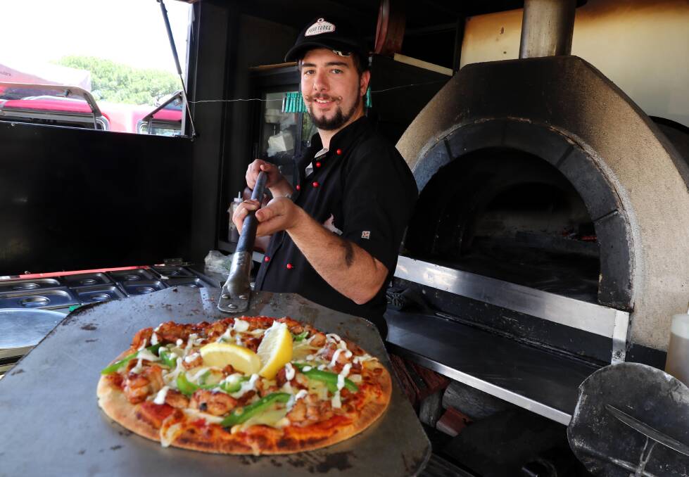 FRESH OUT THE OVEN: Jay Vidler says residents and visitors love knowing their pizza  is made to order for them. Picture: Les Smith 